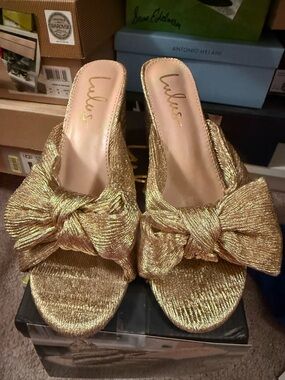 Lulu's Metallic Gold Knot Bow Slide Heels